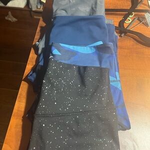 Zyia Leggings lot of 4  gray camo & dark blue .